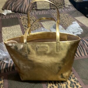 Gold Kate Spade New York Bag size 10 1/2 h by 15 1/2 w. Absolutely gorgeous. New